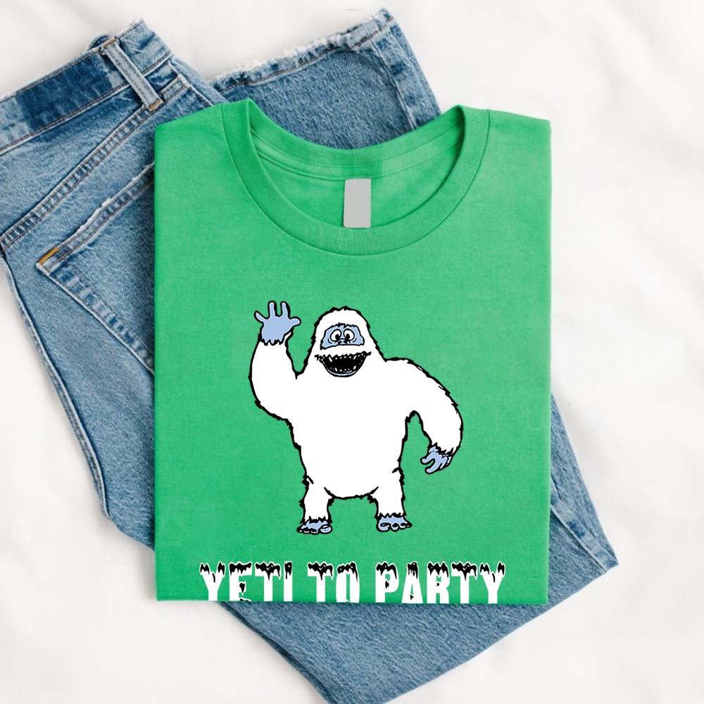 Green t-shirt with a yeti graphic and 'Yeti to Party' text on a white background