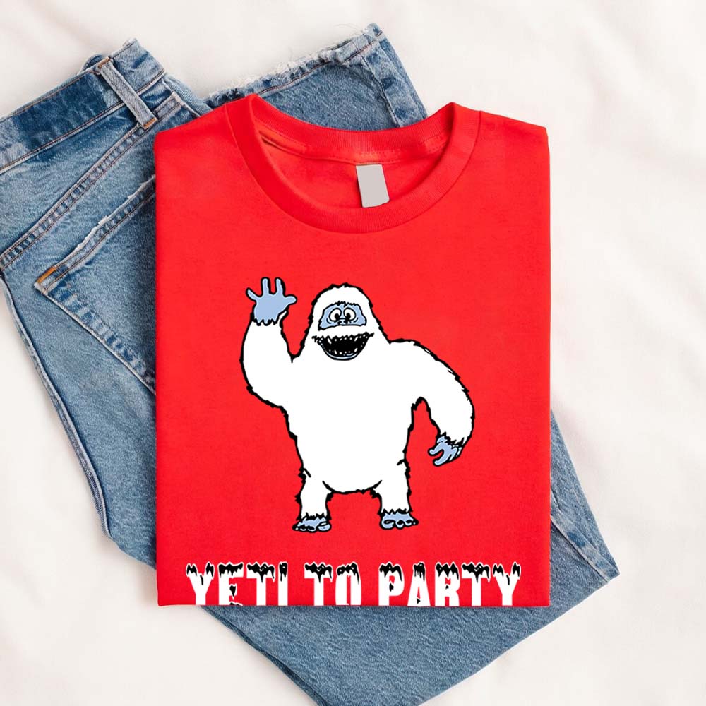 Red t-shirt with a cartoon yeti design and 'Yeti to Party' text on a white background.