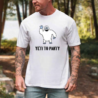 Thumbnail for May include a holiday-themed T-shirt with a cheerful Yeti graphic and a festive “Yeti to Party” phrase in winter colors.