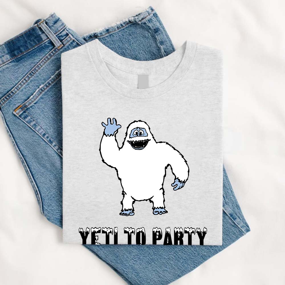 May include a holiday-themed T-shirt with a cheerful Yeti graphic and a festive “Yeti to Party” phrase in winter colors.