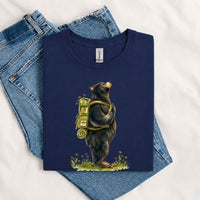Thumbnail for May include a Navy person wearing the Black Bear Gone Camping T-Shirt featuring a camping-themed black bear graphic for nature lovers and outdoor enthusiasts.