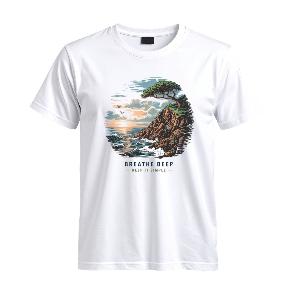 May include a White Breathe Deep Keep It Simple T-Shirt featuring a scenic coastal landscape with ocean waves, rocky cliffs, a windswept tree, and an inspirational nature graphic.