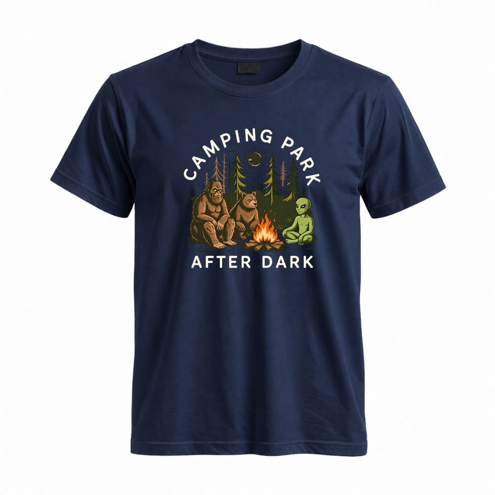 May include a Navy Camping Park After Dark T-Shirt featuring alien, Bigfoot, and bear camping graphics with a nighttime forest scene for campers, hikers, and outdoor adventure enthusiasts.