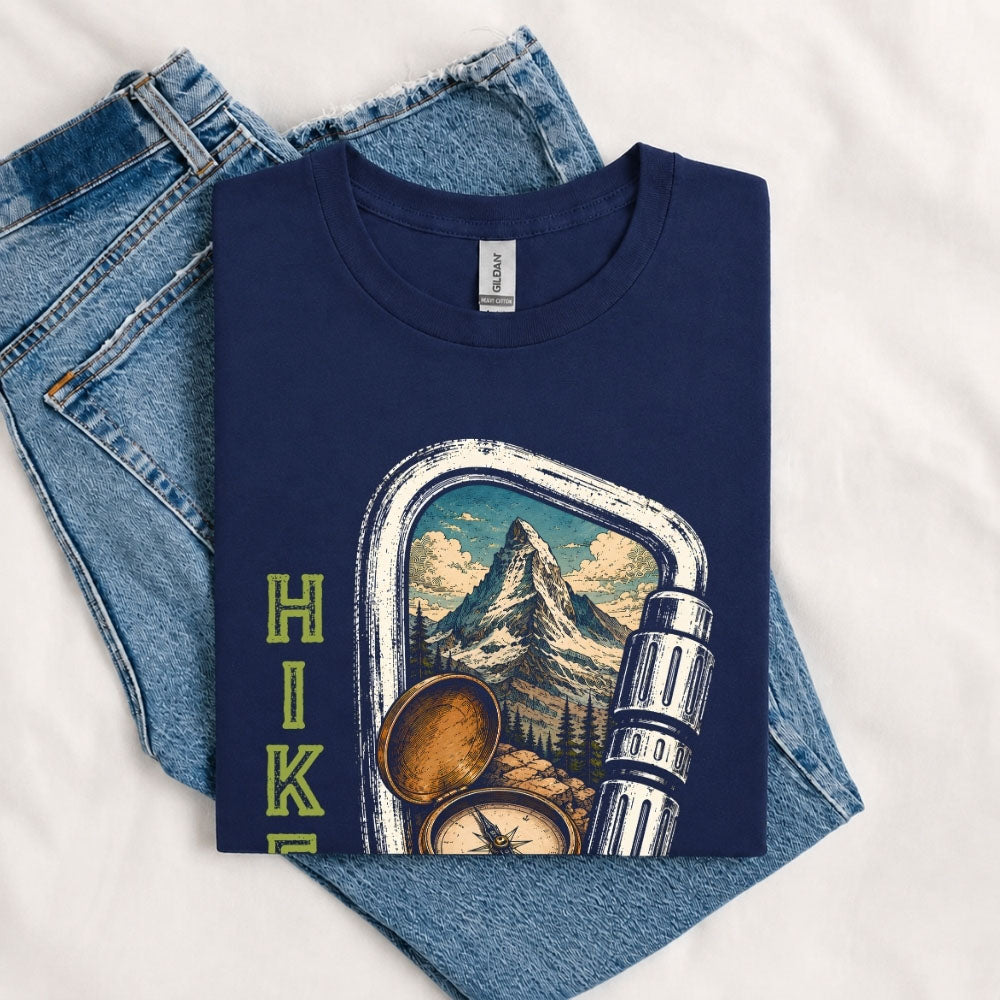 May include a Navy person wearing the Carabiner Camping T-Shirt featuring a mountain adventure graphic with a carabiner design for hikers and outdoor enthusiasts.
