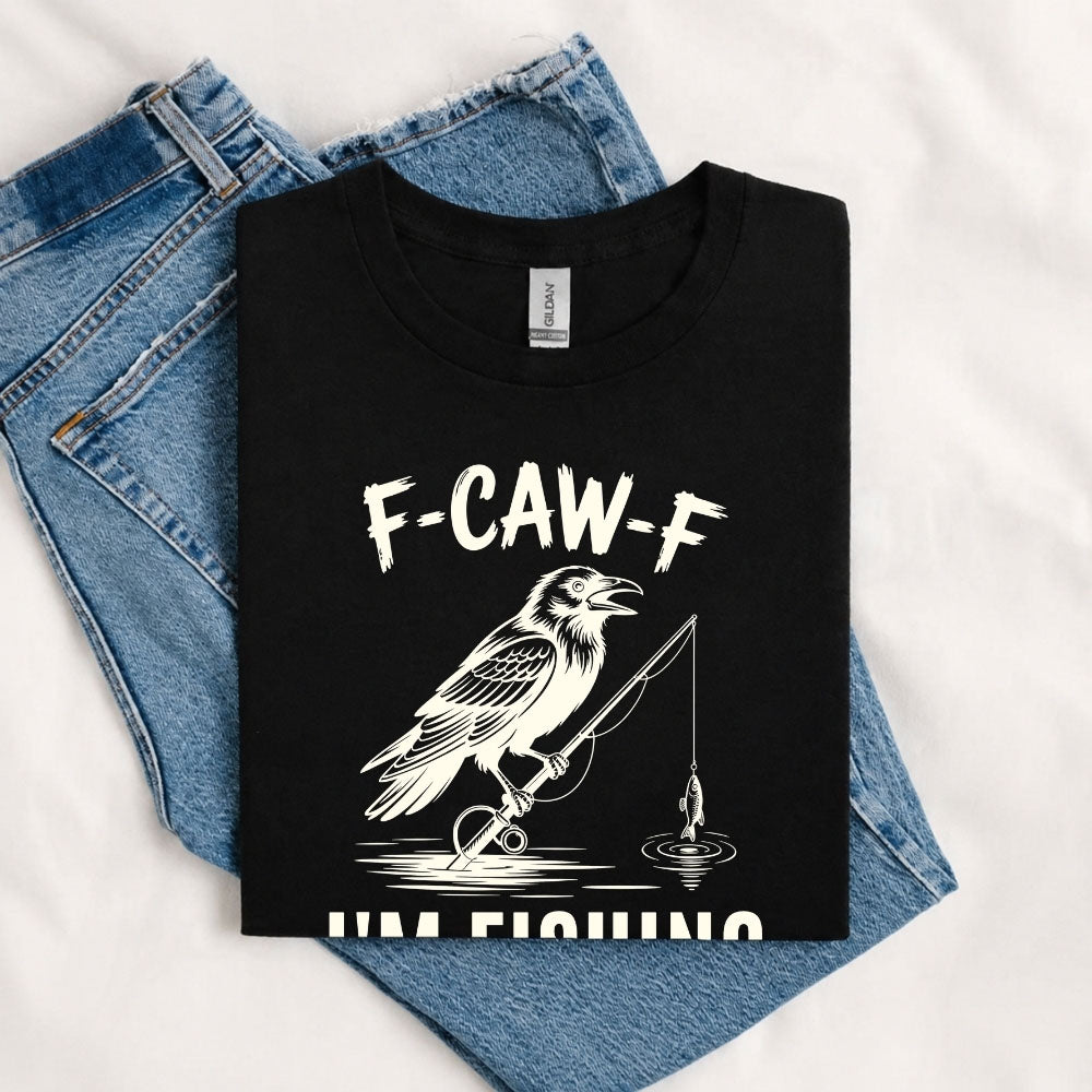May include a Black person wearing the F-CAW-F I'm Fishing Graphic T-Shirt featuring a funny fishing-themed design for anglers and outdoor enthusiasts.