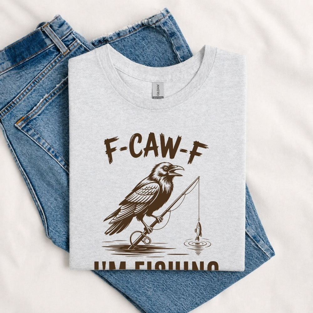 May include a Sport Grey person wearing the F-CAW-F I'm Fishing Graphic T-Shirt featuring a funny fishing-themed design for anglers and outdoor enthusiasts.