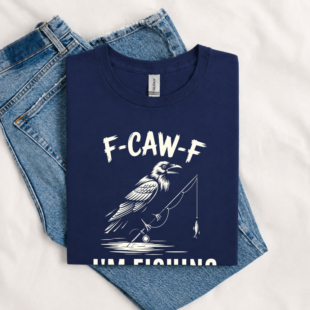 May include a Navy funny fishing-themed graphic T-shirt featuring the phrase “F-CAW-F I’m Fishing” with an outdoor angling design.