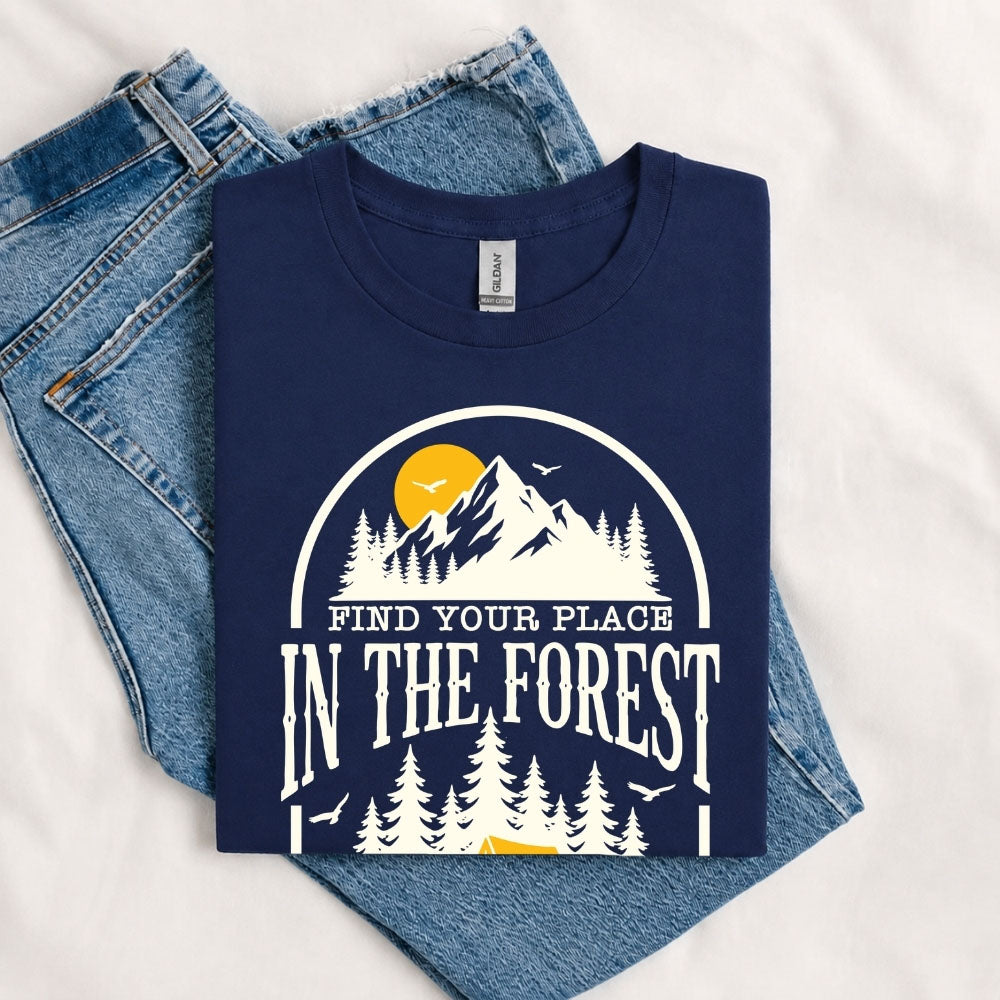 May include a Navy Find Your Place in the Forest T-Shirt featuring a forest-inspired graphic for hikers, campers, backpackers, and nature lovers.