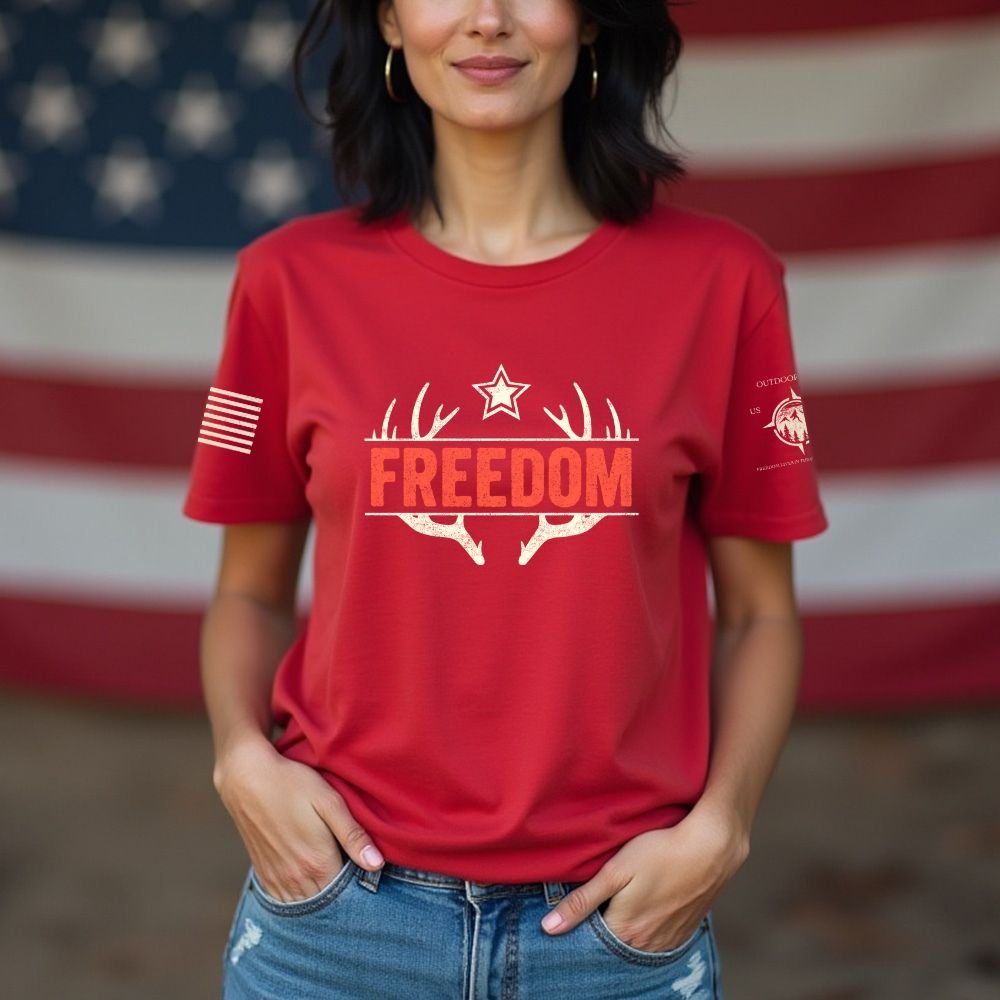 May include person wearing a red Freedom unisex patriotic American liberty t-shirt with bold USA-inspired text design.
