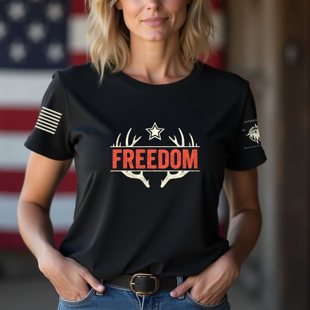 May include person wearing a black Freedom unisex patriotic American liberty t-shirt with bold USA-inspired text design.
