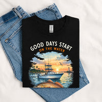 Thumbnail for May include a Black Good Days Start on the Water T-Shirt featuring a fishing boat, peaceful sunset, and lake-inspired graphic for anglers, boaters, and outdoor adventure lovers.