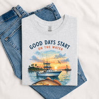 Thumbnail for May include a Sport Grey Good Days Start on the Water T-Shirt featuring a fishing boat, peaceful sunset, and lake-inspired graphic for anglers, boaters, and outdoor adventure lovers.