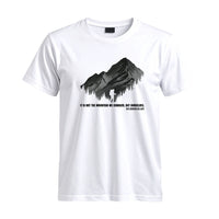 Thumbnail for May include a White It Is Not the Mountain We Conquer but Ourselves T-Shirt featuring an inspirational mountain quote graphic for hikers, climbers, campers, and mountain lovers.