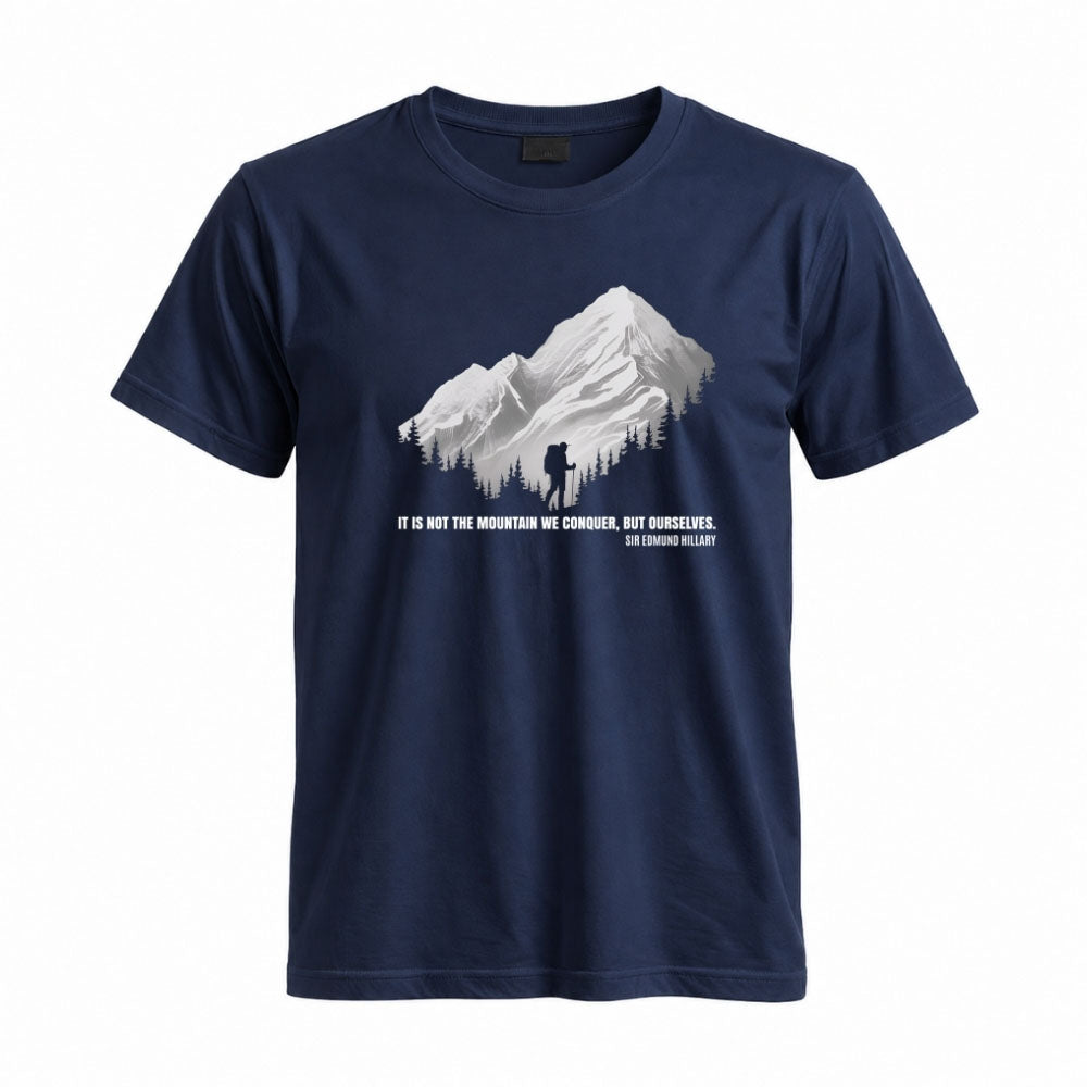 May include a Navy It Is Not the Mountain We Conquer but Ourselves T-Shirt featuring an inspirational mountain quote graphic for hikers, climbers, campers, and mountain lovers.