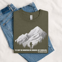 Thumbnail for May include a Military Green It Is Not the Mountain We Conquer but Ourselves T-Shirt featuring an inspirational mountain quote graphic for hikers, climbers, campers, and mountain lovers.