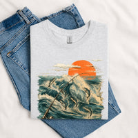 Thumbnail for May include a Sport Grey Jumping Fish & Ocean Waves T-Shirt featuring a leaping fish, fishing rod, crashing ocean waves, and a vibrant sunset graphic for anglers, boaters, and ocean adventure enthusiasts.