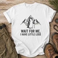 Thumbnail for May include a White cute hiking penguin graphic on a casual t-shirt with outdoor adventure style for hikers, campers, and penguin lovers.