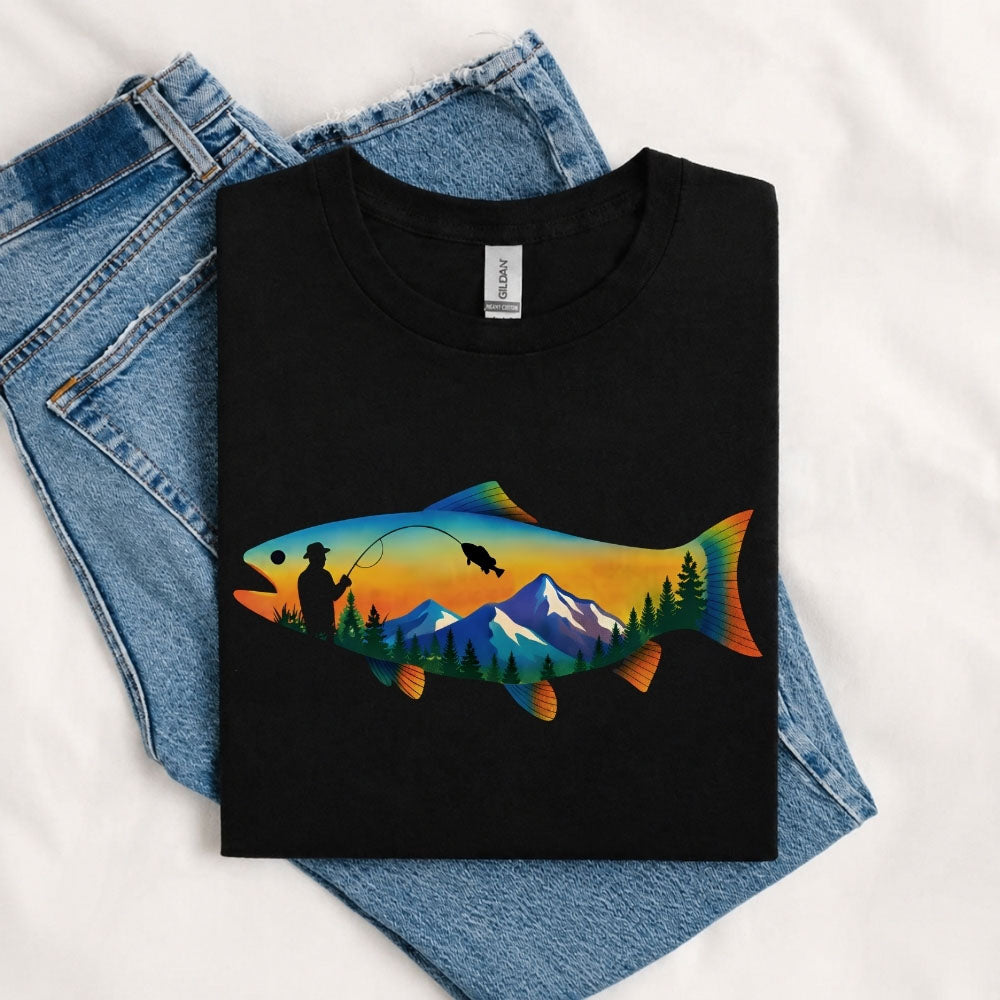 May include a Black person wearing the Mountain Fish Graphic Tee featuring a scenic mountain and fish graphic designed for nature lovers, hikers, and fishing enthusiasts.