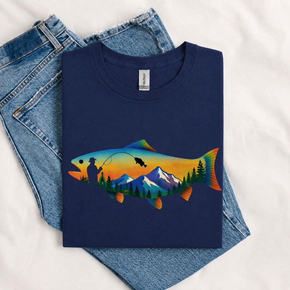 May include a Navy person wearing the Mountain Fish Graphic Tee featuring a scenic mountain and fish graphic designed for nature lovers, hikers, and fishing enthusiasts.