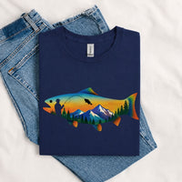 Thumbnail for May include a Navy person wearing the Mountain Fish Graphic Tee featuring a scenic mountain and fish graphic designed for nature lovers, hikers, and fishing enthusiasts.