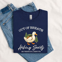 Thumbnail for May include a Navy person wearing the Out of Breath Hiking Society T-Shirt featuring a humorous hiking graphic for nature lovers and outdoor enthusiasts.