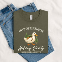 Thumbnail for May include a Military Green person wearing the Out of Breath Hiking Society T-Shirt featuring a humorous hiking graphic for nature lovers and outdoor enthusiasts.