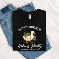 Thumbnail for May include a Black person wearing the Out of Breath Hiking Society T-Shirt featuring a humorous hiking graphic for nature lovers and outdoor enthusiasts.