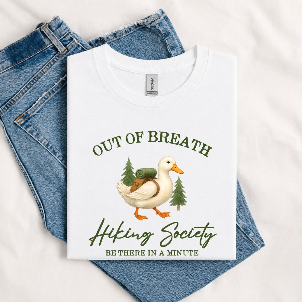 May include a White person wearing the Out of Breath Hiking Society T-Shirt featuring a humorous hiking graphic for nature lovers and outdoor enthusiasts.
