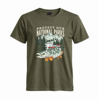 Thumbnail for May include a Military Green Protect Our National Parks Fish X River Graphic T-Shirt featuring a fish silhouette with a scenic river landscape for anglers, hikers, campers, and nature lovers.