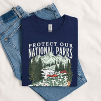 Thumbnail for May include a Navy Protect Our National Parks Fish X River Graphic T-Shirt featuring a fish silhouette with a scenic river landscape for anglers, hikers, campers, and nature lovers.