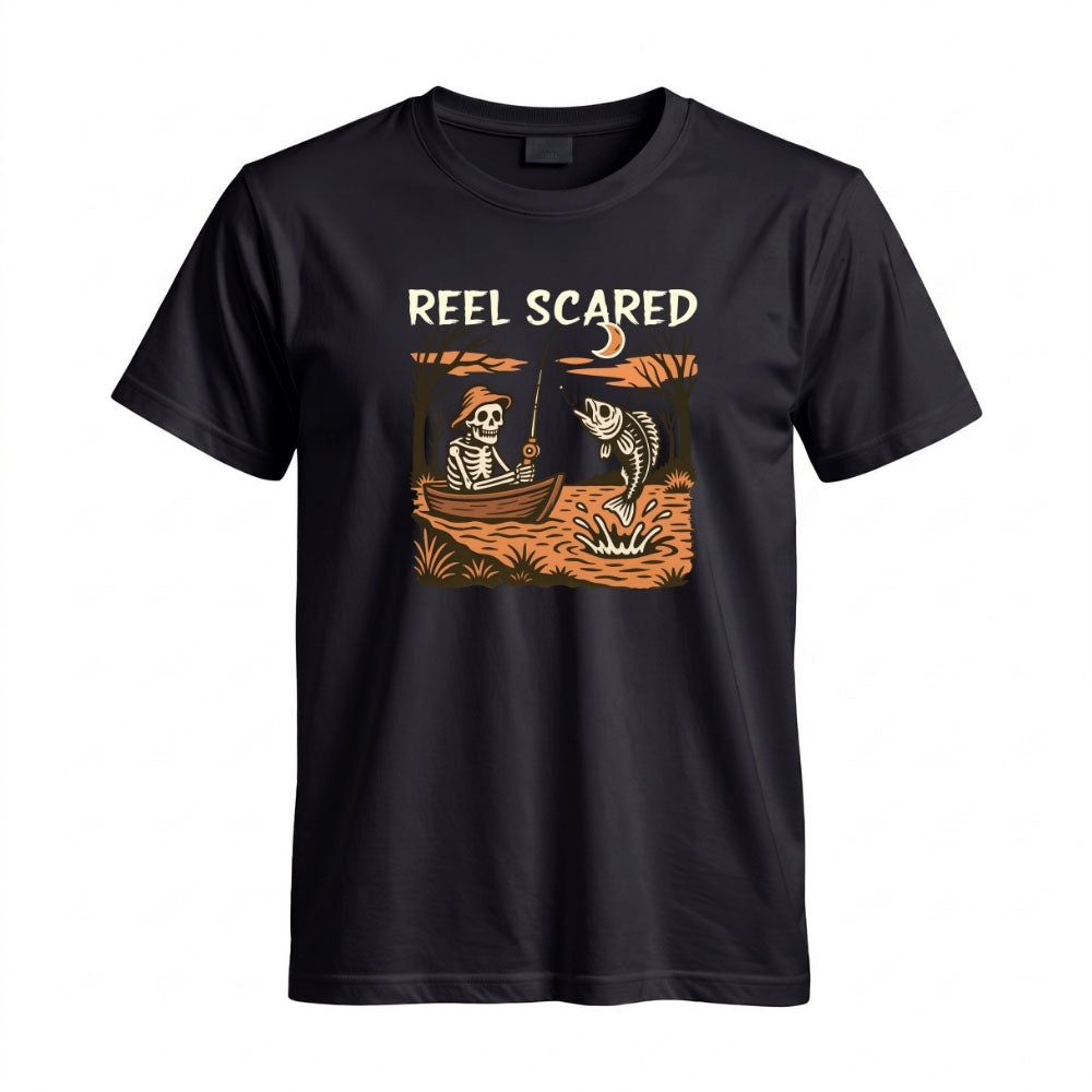 May include a Black person wearing the Reel Scared Halloween T-Shirt featuring a funny fishing-inspired Halloween graphic for spooky season celebrations.