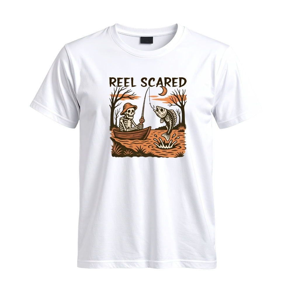 May include a White person wearing the Reel Scared Halloween T-Shirt featuring a funny fishing-inspired Halloween graphic for spooky season celebrations.