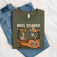 Thumbnail for May include a Military Green person wearing the Reel Scared Halloween T-Shirt featuring a funny fishing-inspired Halloween graphic for spooky season celebrations.
