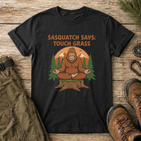 Thumbnail for May include a Black funny Sasquatch Says graphic t-shirt featuring a Bigfoot-inspired design for camping, hiking, outdoor humor, and cryptid fans.