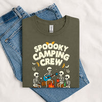 Thumbnail for May include a Military Green Spooky Camping Crew T-Shirt featuring a funny Halloween camping graphic with festive fall elements for campers and outdoor enthusiasts.