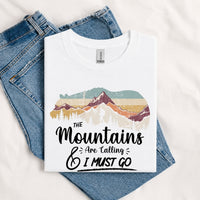 Thumbnail for May include a White The Mountains Are Calling and I Must Go T-Shirt featuring an inspirational mountain graphic for hikers, campers, backpackers, and outdoor adventure lovers.