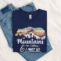 Thumbnail for May include a Navy The Mountains Are Calling and I Must Go T-Shirt featuring an inspirational mountain graphic for hikers, campers, backpackers, and outdoor adventure lovers.