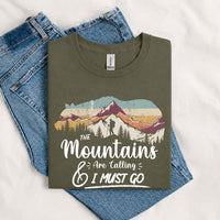 Thumbnail for May include a Military Green The Mountains Are Calling and I Must Go T-Shirt featuring an inspirational mountain graphic for hikers, campers, backpackers, and outdoor adventure lovers.