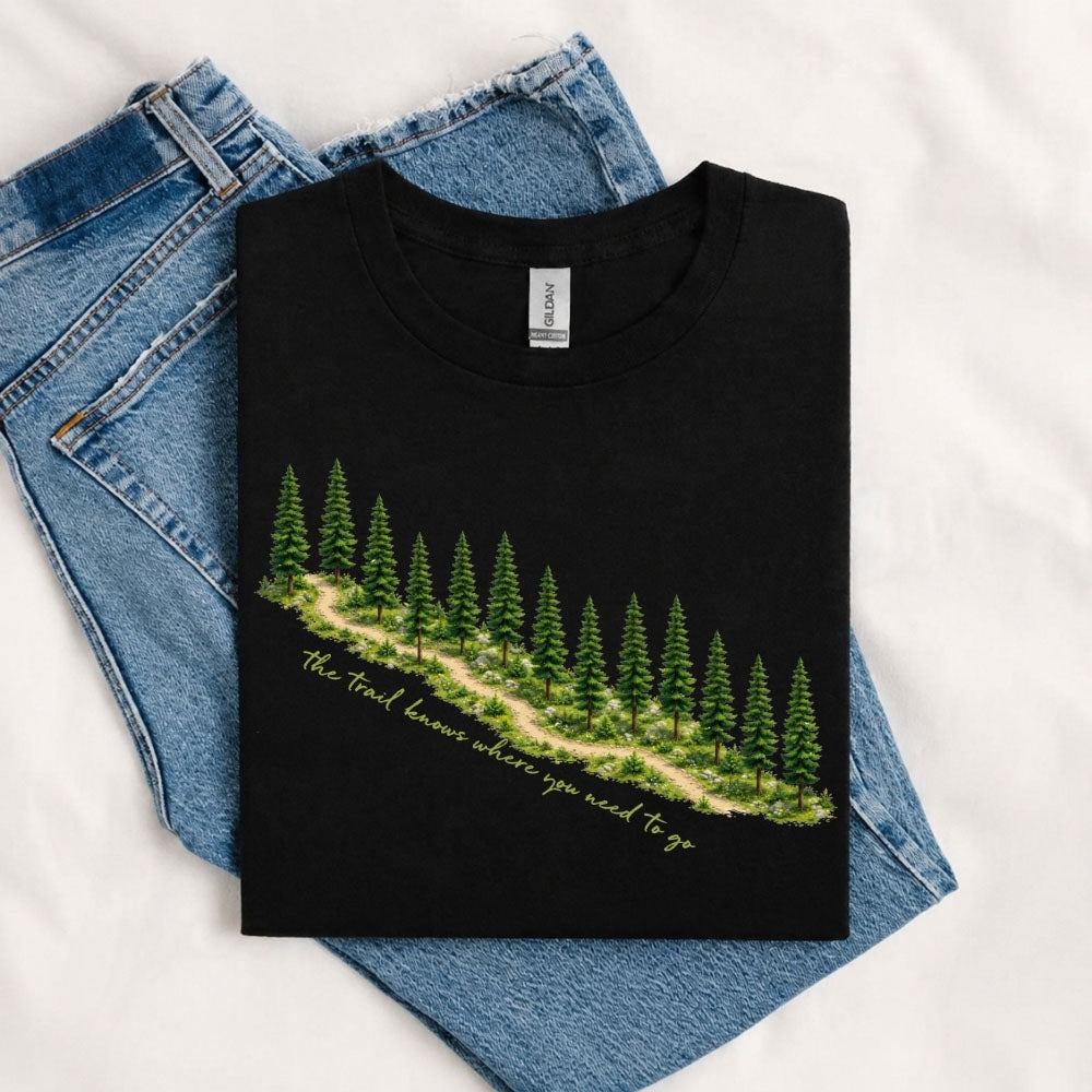 May include a Black The Trail Knows Where You Need to Go T-Shirt featuring an inspirational hiking graphic with outdoor adventure artwork for hikers, campers, backpackers, and nature lovers.