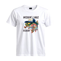 Thumbnail for May include a White Wishin' I Was Fishin' T-Shirt featuring a fishing-inspired graphic for anglers, boaters, lake lovers, and outdoor enthusiasts.
