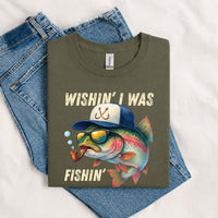 Thumbnail for May include a Military Green Wishin' I Was Fishin' T-Shirt featuring a fishing-inspired graphic for anglers, boaters, lake lovers, and outdoor enthusiasts.